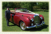 1957 Bentley S1 convertible in Burgundy with Cream leather interior and Burgundy piping.