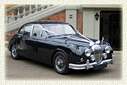 1967 Daimler (with MK II body) in Navy Blue with chrome wire wheels and light Blue leather interior