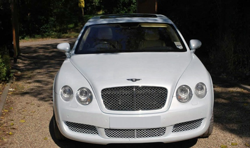 Bentley Continental Flying Spur in White with cream leather interior
and private plates (LWB long wheelbase model)