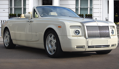 Rolls Royce Phantom Limousine drop-head convertible in Corniche White with Cream leather interior and private plates