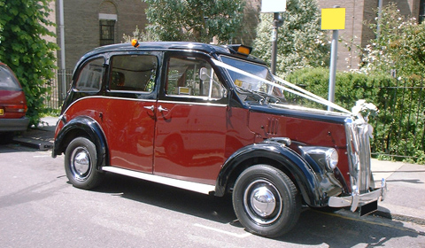 1966 Beardmore in Burgundy with Maroon leather interior