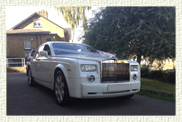 Modern Rolls Royce Phantom in Pearlescent White with light biscuit leather interior