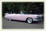1959 Pink Cadillac convertible<br>
                  (with electronically retractable white roof)